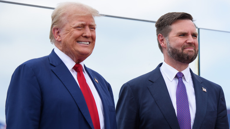 Donald Trump and JD Vance smiling