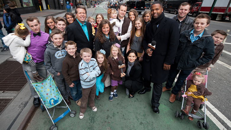 The Duggar family posing