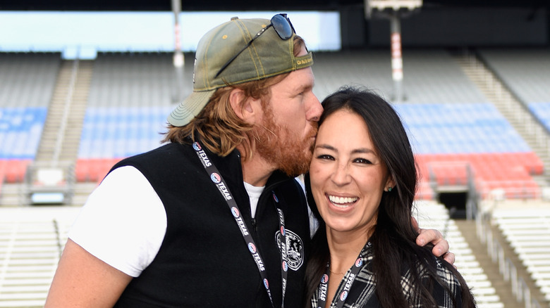 Chip kissing Joanna Gaines 