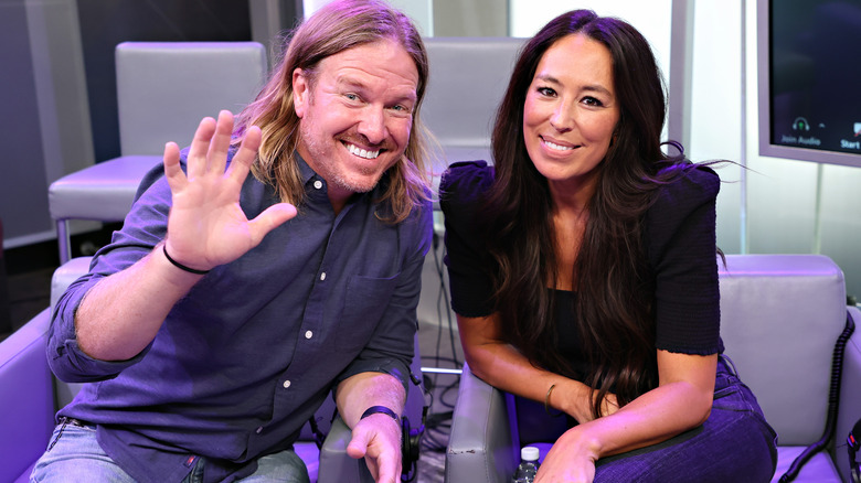 Chip waving Joanna Gaines smiling