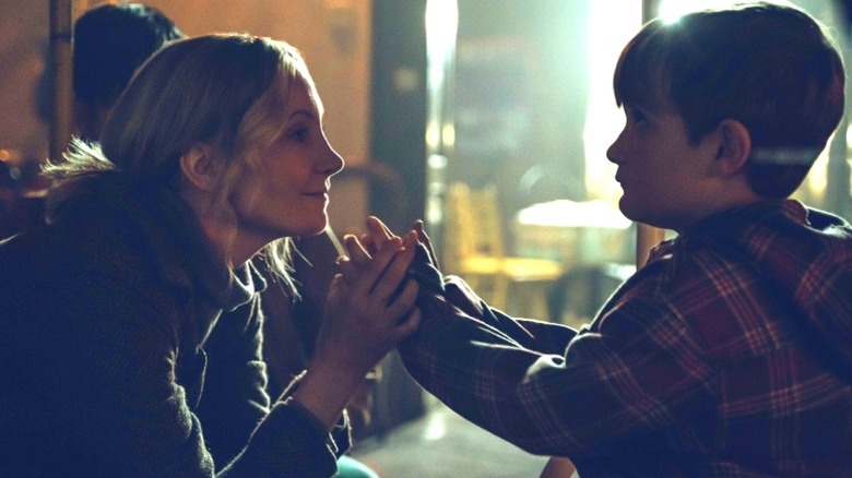 Joanne Froggatt smiling at Taylor Fay in Last Light