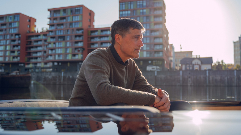 Matthew Fox sitting outside in Last Light