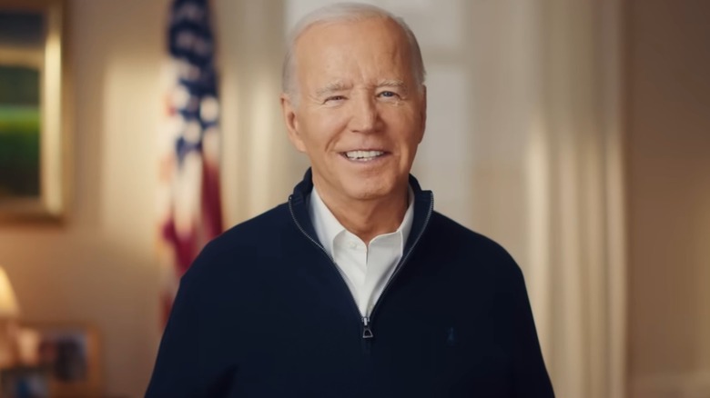 Joe Biden in a dark blue quarter zip