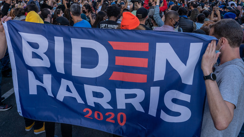 Biden Harris 2020 flag in crowd 