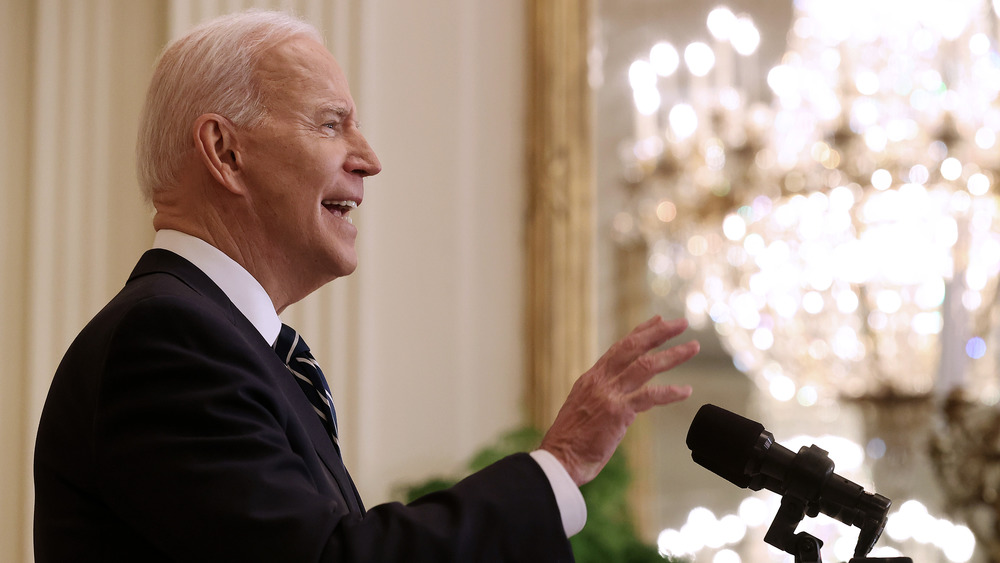 Joe Biden waving his hands at first press conference