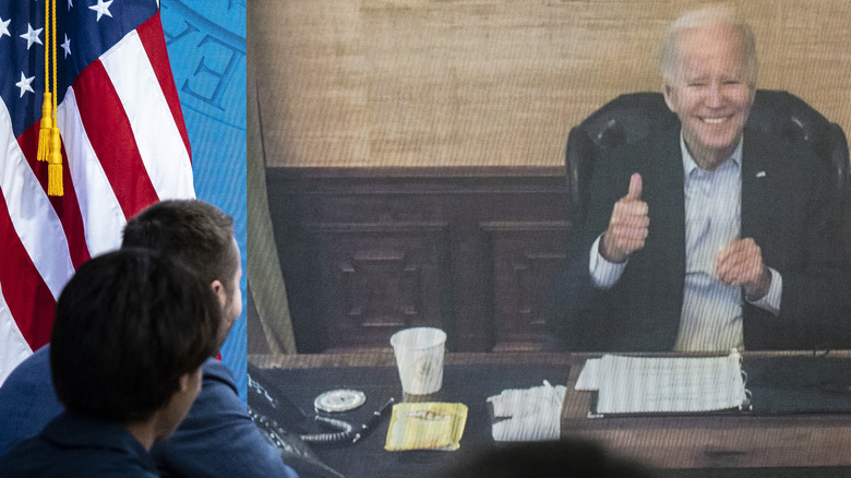 Joe Biden thumbs up in a virtual meeting