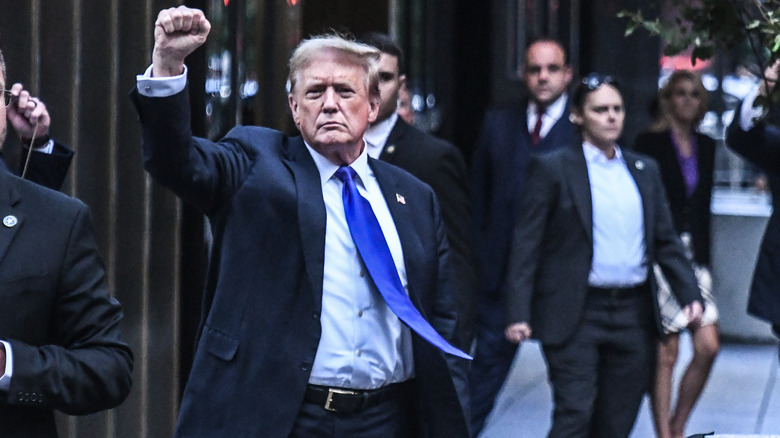 Donald Trump after verdict raising fist 