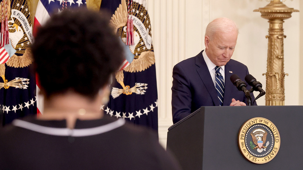 The president listening to a question