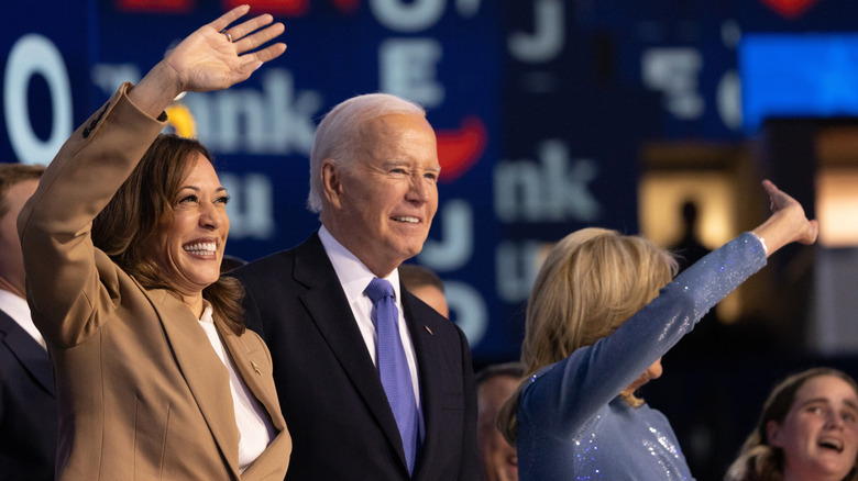 Kamala Harris waving with Joe Biden