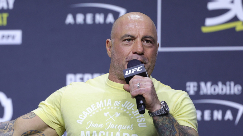 Joe Rogan speaking into a UFC microphone