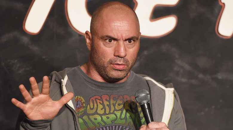 Joe Rogan on stage doing stand-up comedy in 2015