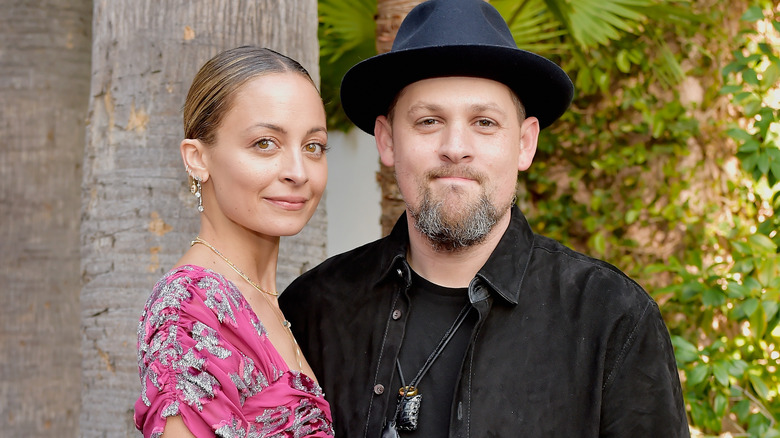 Nicole Richie and Joel Madden posing together