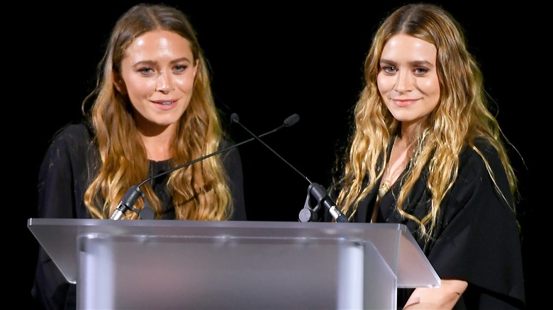 Twins Mary-Kate and Ashley Olsen during a speech