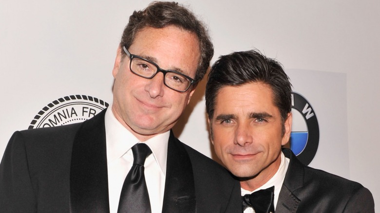 Bob Saget and John Stamos posing