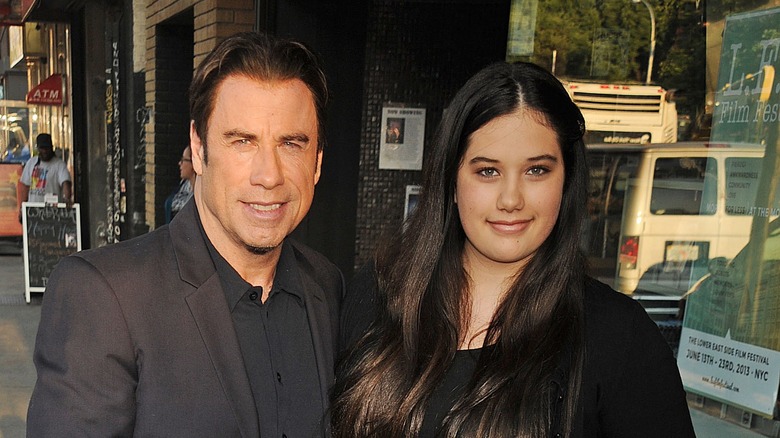 Ella Bleu Travolta and John Travolta posing