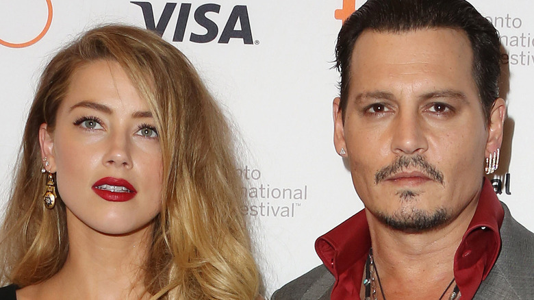 Johnny Depp and Amber Heard on red carpet