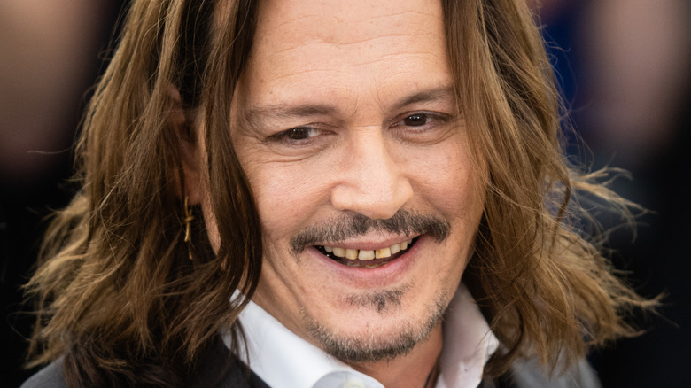 Johnny Depp smiling in 2023