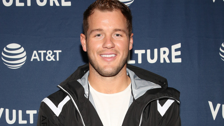 Colton Underwood smiling at event