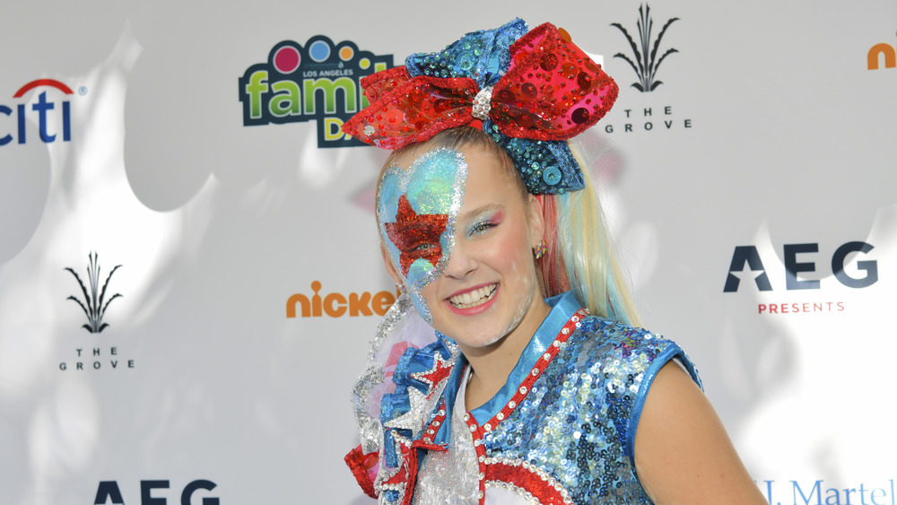 JoJo Siwa wearing red and blue