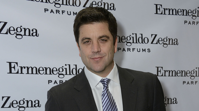 Josh Elliott posing at an event