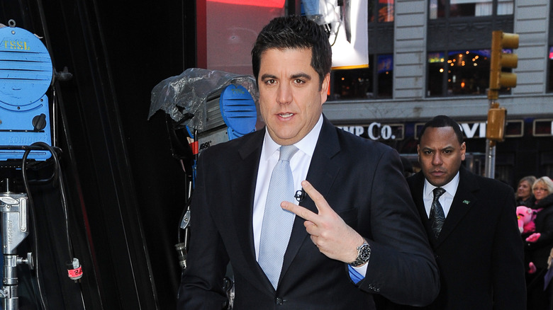 Josh Elliott giving the peace sign