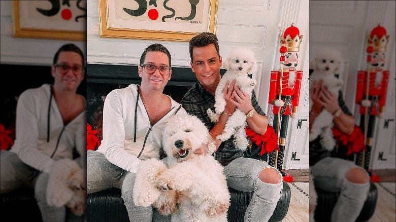 Josh Flagg and Bobby Boyd pose with their dogs