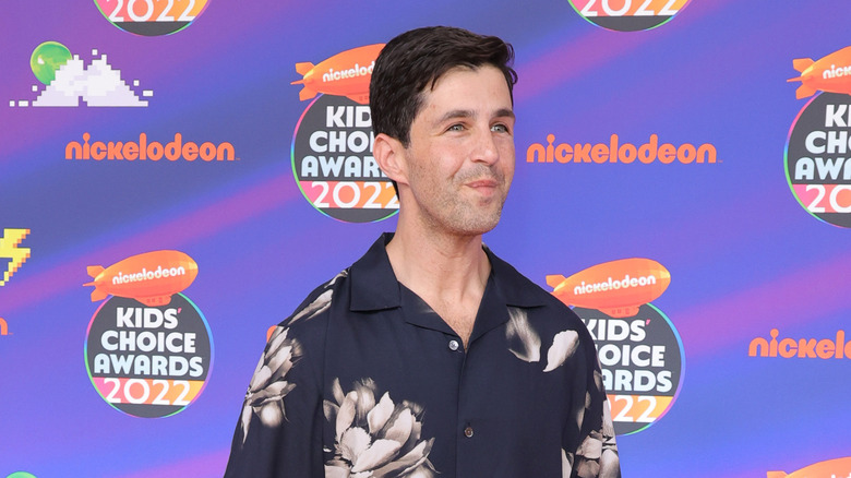 Josh Peck smiling at Nickelodeon event