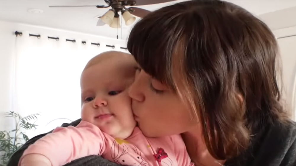 Joy-Anna Dugger kisses daughter Evelyn