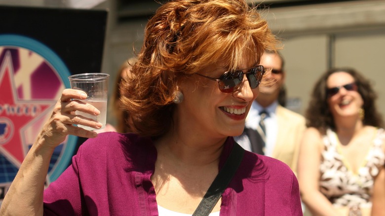 Joy Behar cheersing