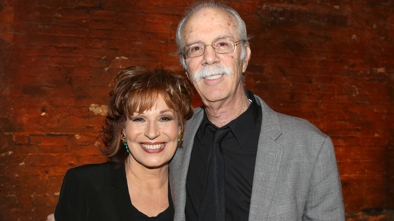 Joy and Steve smile backstage