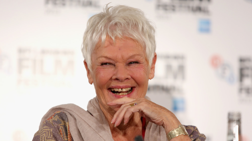 Dame Judi Dench laughing