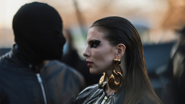 Ye in a balaclava and Julia Fox in immaculate earrings