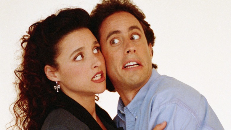 Julia Louis-Dreyfus and Jerry Seinfeld cheek to cheek