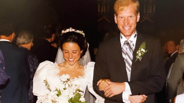 Julia Louis-Dreyfus and husband Brad Hall smiling