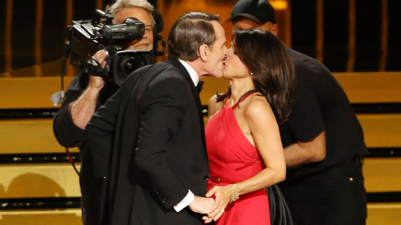 Julia Louis-Dreyfus and Bryan Cranston kissing