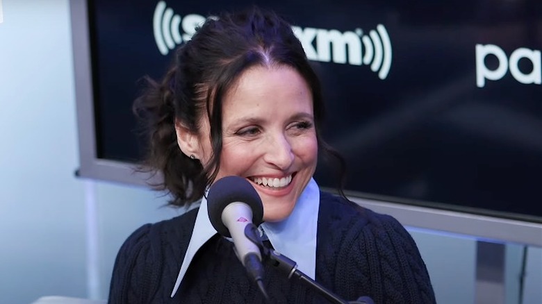 Julia Louis-Dreyfus speaking into microphone