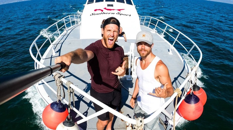 Derek and Brooks on a boat 