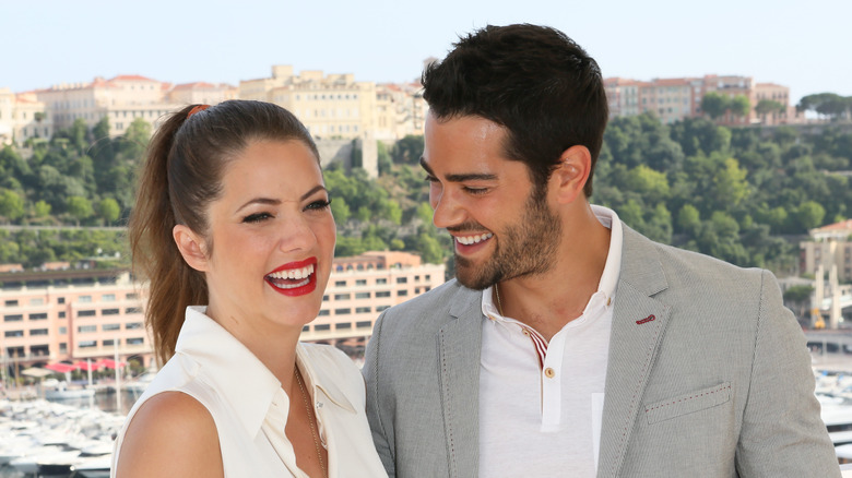 Julie Gonzalo laughing with Jesse Metcalfe