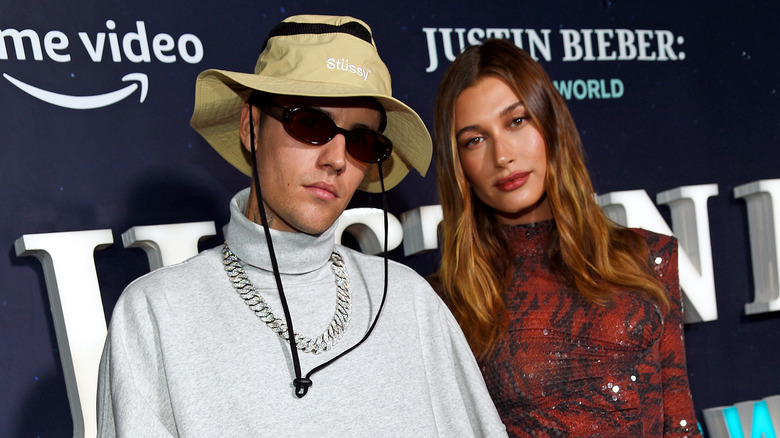 Justin Bieber and Hailey Bieber posing at event