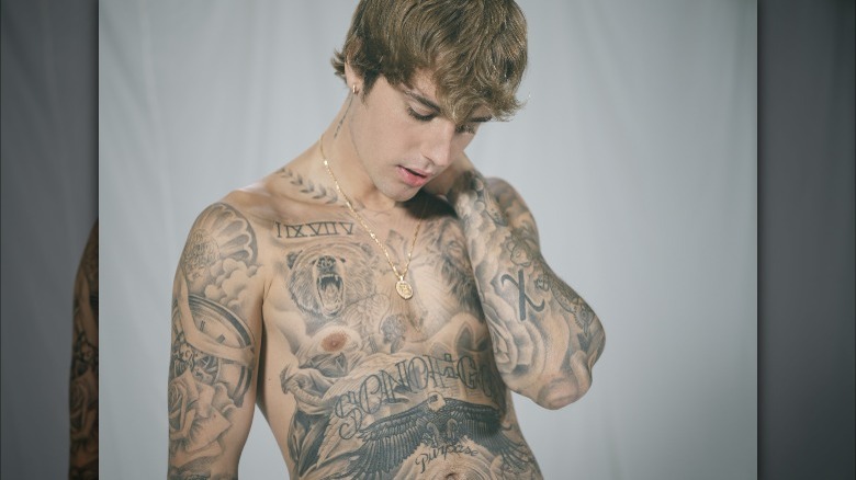 Justin Bieber / David Beckham Neck Tattoo ⚽️ 🎤 Cross with wings 🔥 A... | Neck  Tattoo Ideas | TikTok