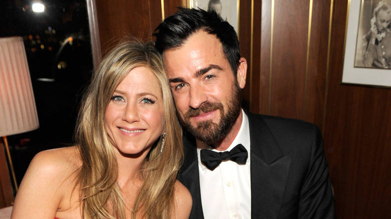 Justin Theroux and Jennifer Aniston cuddling up