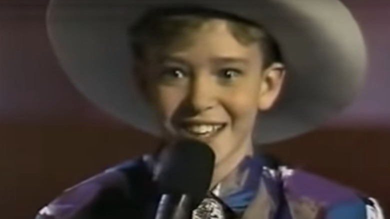 Justin Timberlake performing in hat