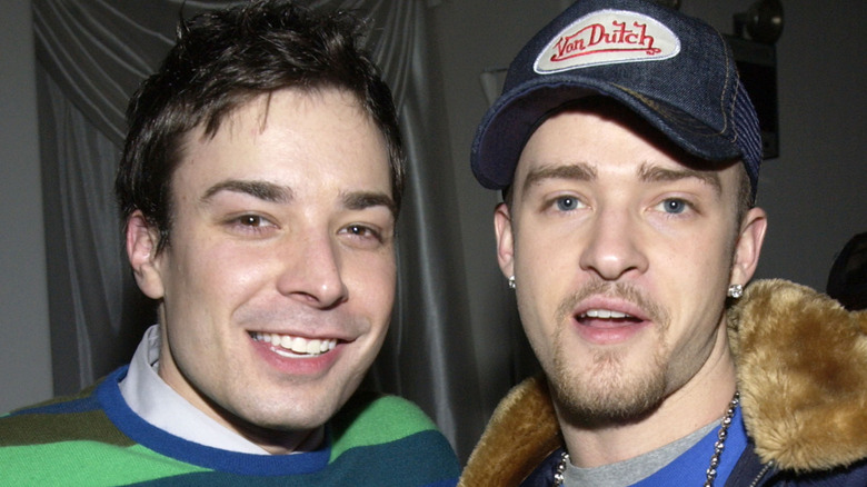 Jimmy Fallon smiling next to Justin Timberlake.