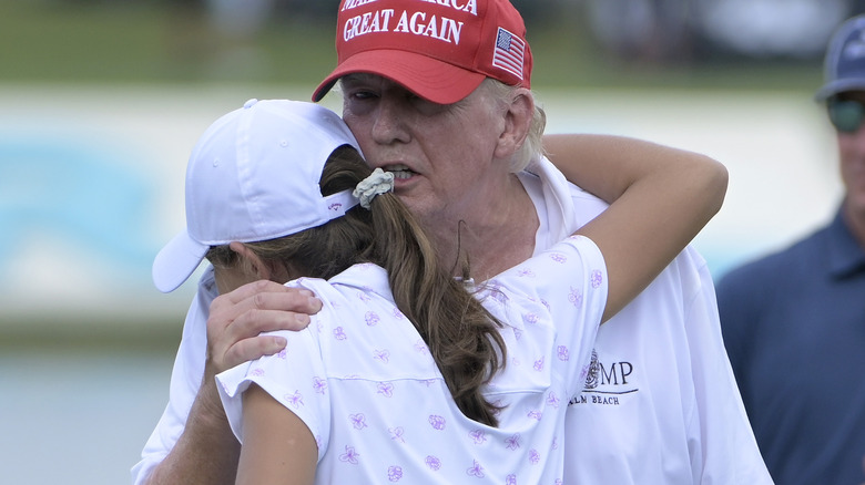 Kai Trump hugging Donald Trump