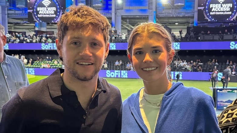 Niall Horan takes a photo with Kai Trump