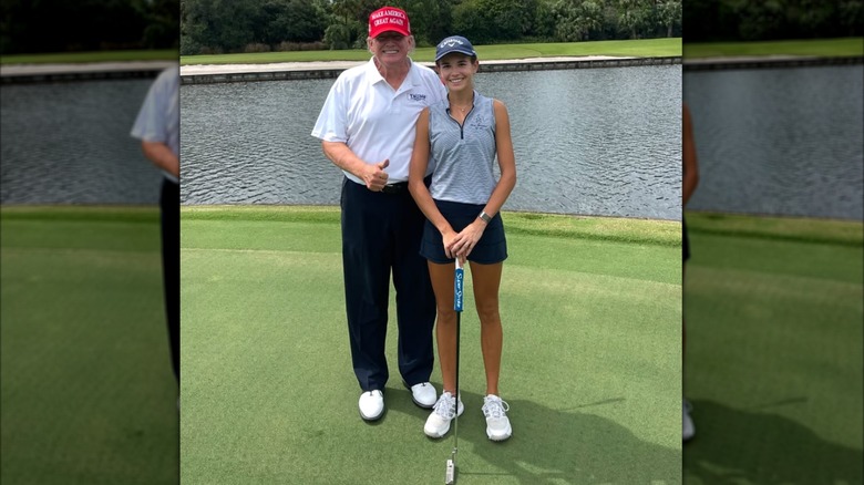 Donald Trump and Kai Trump playing golf together