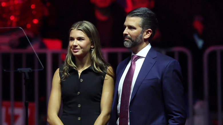 Kai Trump and Donald Trump Jr. standing together at an event