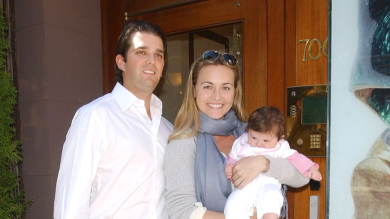 Donald Trump Jr, and Vanessa Trump posing with baby Kai