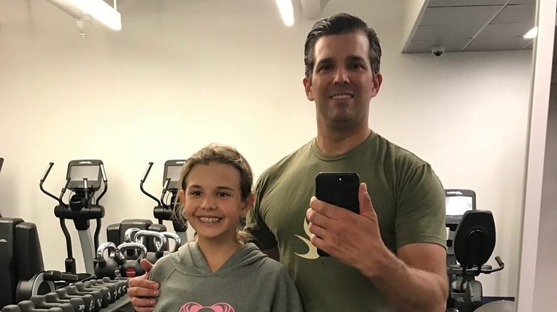 Donald Trump Jr. taking a picture of himself and Kai at a gym