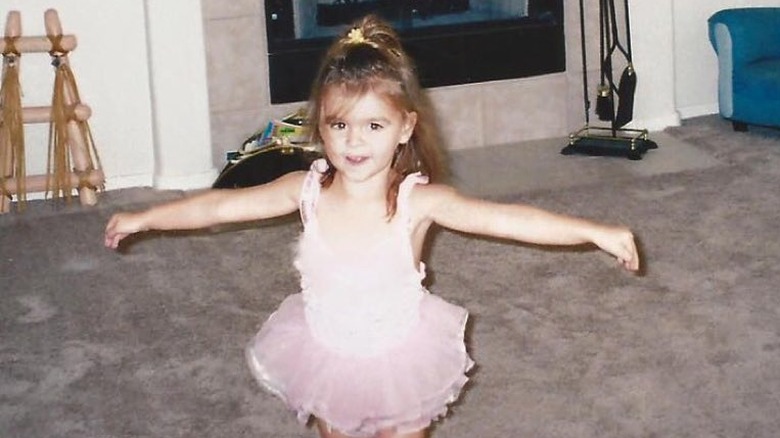 Young Kalani Hilliker dancing indoors